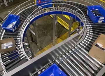 Phân biệt băng tải xoắn ốc và máy nâng hàng